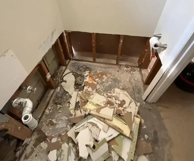 Bathroom taken down to the studs after a sewage backup
